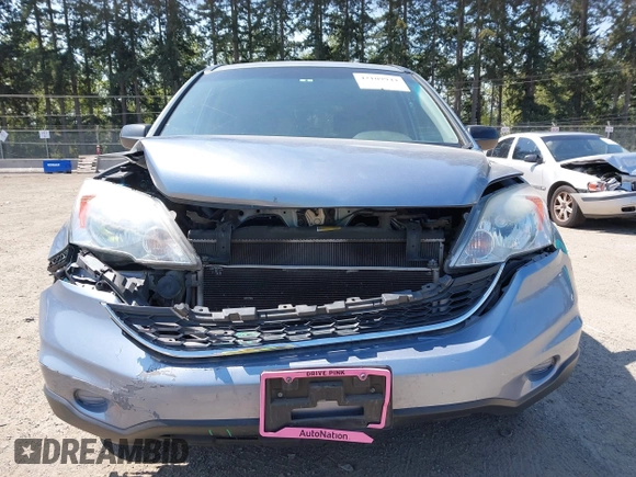 2010 Honda CR-V EX with VIN 5J6RE4H52AL023242, listed as a IAAI auction lot 42109944 with 143,817 mi miles. Bid and sale history available at carsss.com. Image 12.