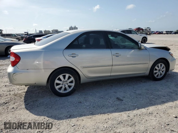 2002 Toyota Camry XLE z VIN 4T1BF32K22U532171, wystawiony jako Copart lot #54527965 z przebiegiem 165 637 mil mil oraz Szkoda całkowita • Salvage title. Historia ofert i sprzedaży dostępna na DreamBid. Obrazek 3.
