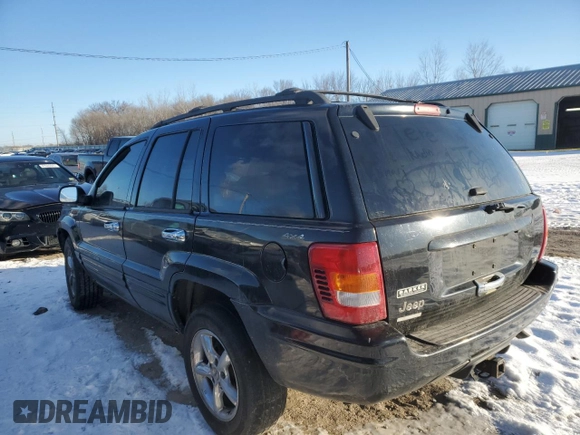 2001 Jeep Grand Cherokee Limited with VIN 1J4GW58N41C636179, listed as a Copart auction lot 88356915 with 184,243 mi miles and Clean Title. Bid and sale history available at carsss.com. Image 2.