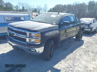 2014 Chevrolet Silverado 1500 LT with VIN 1GCVKREH3EZ320659, listed as a IAAI auction lot 41665352 with 105,574 mi miles and . Bid and sale history available at DreamBid. Image 2.