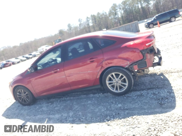 2015 Ford Focus SE with VIN 1FADP3F28FL344910, listed as a Copart auction lot 48176805 with 101,244 mi miles and Salvage Title. Bid and sale history available at DreamBid. Image 2.
