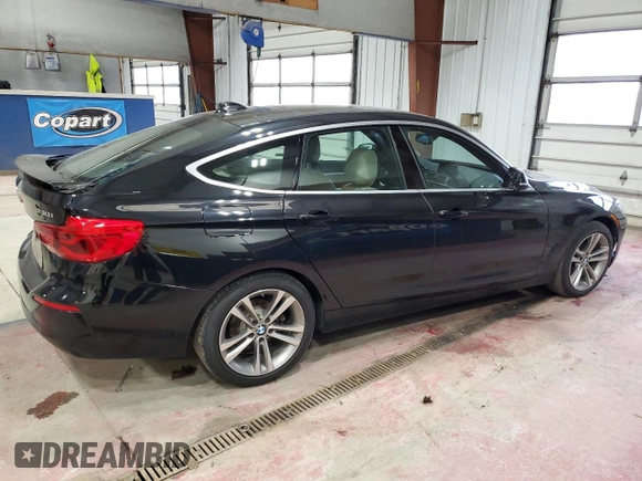 2019 BMW 3 Series 330i xDrive with VIN WBA8Z9C58KB220690, listed as a Copart auction lot 87442724 with 59,204 mi miles and Clean Title. Bid and sale history available at carsss.com. Image 3.
