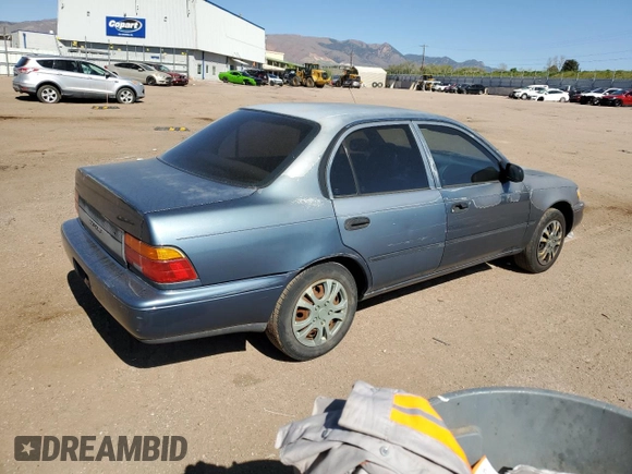 1994 Toyota Corolla with VIN 1NXAE04B7RZ129212, listed as a Copart auction lot 56760095 with 156,822 mi miles and Non repairable. Bid and sale history available at DreamBid. Image 3.