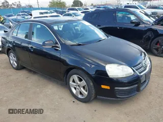 2009 Volkswagen Jetta Sedan SE with VIN 3VWRZ71K69M143824, listed as a IAAI auction lot 41967432 with 98,120 mi miles. Bid and sale history available at carsss.com. Image 1.
