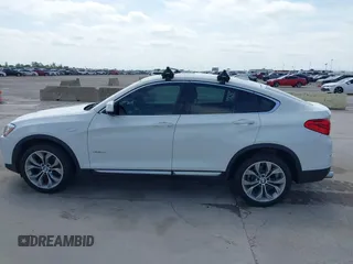2018 BMW X4 xDrive28i z VIN 5UXXW3C52J0T82067, wystawiony jako IAAI lot #42032671 z przebiegiem 101 331 mil mil oraz . Historia ofert i sprzedaży dostępna na DreamBid. Obrazek 14.