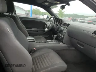 2013 Dodge Challenger SXT z VIN 2C3CDYAG8DH609306, wystawiony jako Copart lot #55772985 z przebiegiem 179 231 mil mil oraz Szkody całkowita. Historia ofert i sprzedaży dostępna na DreamBid. Obrazek 10.