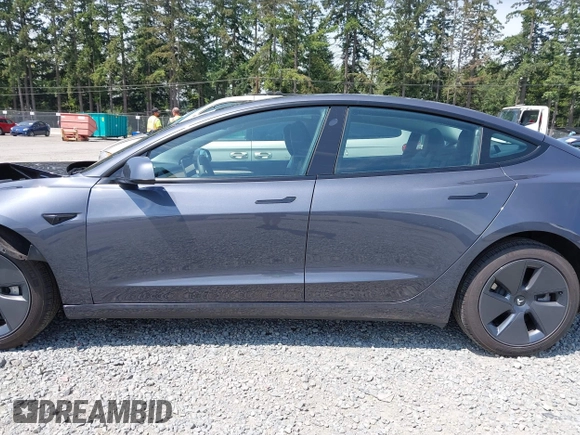 2023 Tesla Model 3 with VIN 5YJ3E1EA6PF664045, listed as a IAAI auction lot 42561039 with 18,708 mi miles and . Bid and sale history available at DreamBid. Image 15.