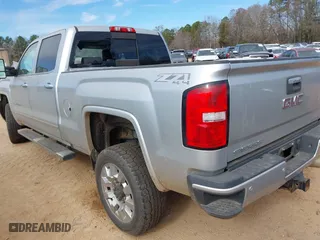 2017 GMC Sierra 2500HD Denali with VIN 1GT12UEY8HF216479, listed as a IAAI auction lot 41678315 with 127,057 mi miles. Bid and sale history available at carsss.com. Image 3.