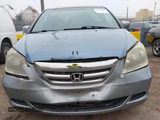 2006 Honda Odyssey EX-L с VIN 5FNRL38746B074680, выставлен на аукционе IAAI как лот 41140462 с пробегом 195 459 миль миль и . История ставок и продаж доступна на DreamBid. Изображение 6.