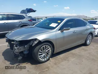 2021 Lexus ES 300h Luxury with VIN 58AEA1C15MU008479, listed as a IAAI auction lot 42638671 with 44,845 mi miles and . Bid and sale history available at DreamBid. Image 2.