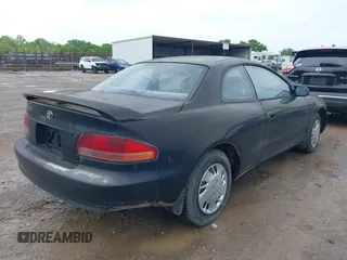 1995 Toyota Celica ST with VIN JT2AT00F7S0040443, listed as a IAAI auction lot 42125327 with 286,767 mi miles. Bid and sale history available at carsss.com. Image 4.