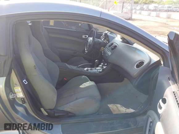 2008 Mitsubishi Eclipse GS z VIN 4A3AK24F28E036454, wystawiony jako IAAI lot #42276489 z przebiegiem 153 707 mil mil oraz . Historia ofert i sprzedaży dostępna na DreamBid. Obrazek 5.