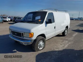 2006 Ford Econoline Cargo with VIN 1FTSE34L66HB03093, listed as a IAAI auction lot 41197550 with 310,863 mi miles. Bid and sale history available at carsss.com. Image 2.
