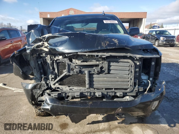2017 Chevrolet Silverado 1500 LT with VIN 3GCUKREC4HG257348, listed as a Copart auction lot 84798884 with 200,013 mi miles and Salvage Title. Bid and sale history available at DreamBid. Image 5.
