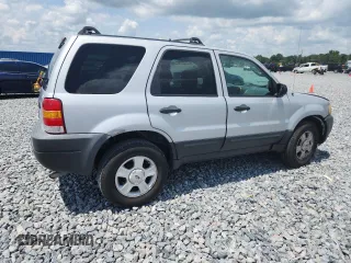 2003 Ford Escape XLT Popular with VIN 1FMYU03103KA06199, listed as a Copart auction lot 58731515 with 181,429 mi miles and Salvage title. Bid and sale history available at DreamBid. Image 3.