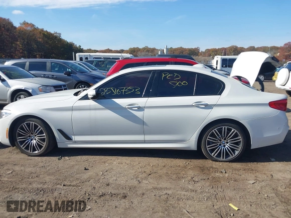 2018 BMW 5 Series 530i xDrive with VIN WBAJA7C58JG907988, listed as a IAAI auction lot 38011708 with Not provided miles and . Bid and sale history available at DreamBid. Image 13.