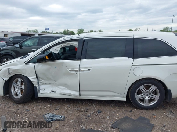 2013 Honda Odyssey Touring with VIN 5FNRL5H96DB074819, listed as a IAAI auction lot 41898358 with 123,428 mi miles and . Bid and sale history available at carsss.com. Image 14.