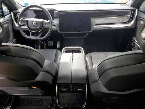 2023 Rivian R1T Adventure with VIN 7FCTGBAA5PN026063, listed as a Copart auction lot 66916194 with Not Provided miles and Salvage Title. Bid and sale history available at DreamBid. Image 8.
