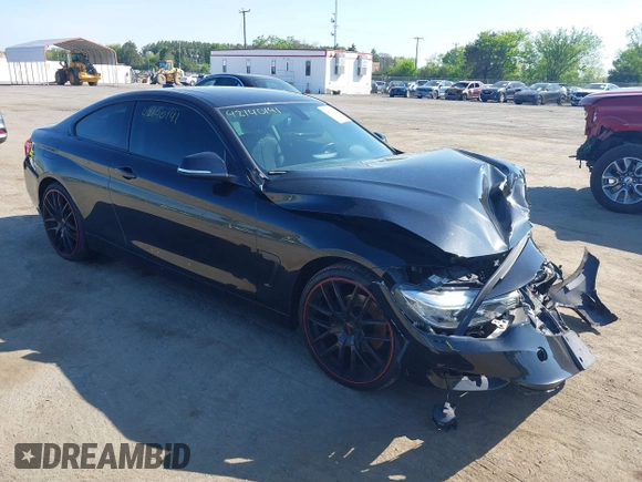 2015 BMW 4 Series 428i xDrive with VIN WBA3N9C59FK248249, listed as a IAAI auction lot 42140141 with 106,916 mi miles and . Bid and sale history available at DreamBid. Image 1.
