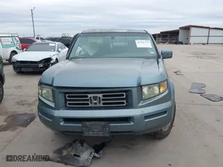 2006 Honda Ridgeline RTL with VIN 2HJYK16566H571367, listed as a IAAI auction lot 41342775 with 250,432 mi miles. Bid and sale history available at carsss.com. Image 12.