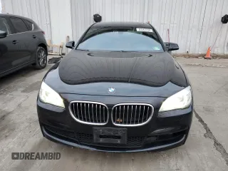 2014 BMW 7 Series 740Li xDrive with VIN WBAYF4C59ED281776, listed as a Copart auction lot 83563234 with 77,899 mi miles and Salvage Title. Bid and sale history available at carsss.com. Image 5.