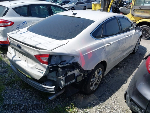 2016 Ford Fusion Titanium Hybrid with VIN 3FA6P0RU1GR259947, listed as a IAAI auction lot 41695377 with 97,605 mi miles. Bid and sale history available at carsss.com. Image 4.