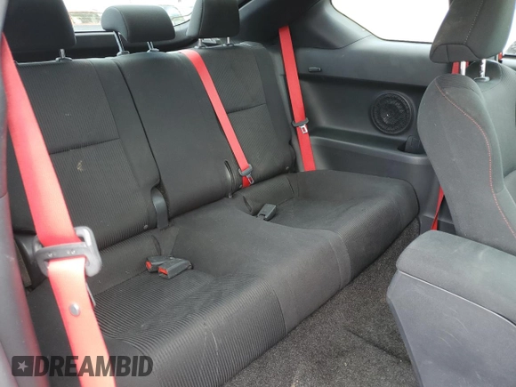 2016 Scion tC z VIN JTKJF5C79GJ025565, wystawiony jako Copart lot #58747815 z przebiegiem 89 174 mil mil oraz Szkoda całkowita • Salvage title. Historia ofert i sprzedaży dostępna na DreamBid. Obrazek 10.