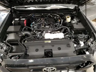 2024 Toyota Tacoma SR5 z VIN 3TMLB5JN6RM070515, wystawiony jako Copart lot #88514465 z przebiegiem 126 mil mil oraz Szkody całkowita. Historia ofert i sprzedaży dostępna na DreamBid. Obrazek 11.