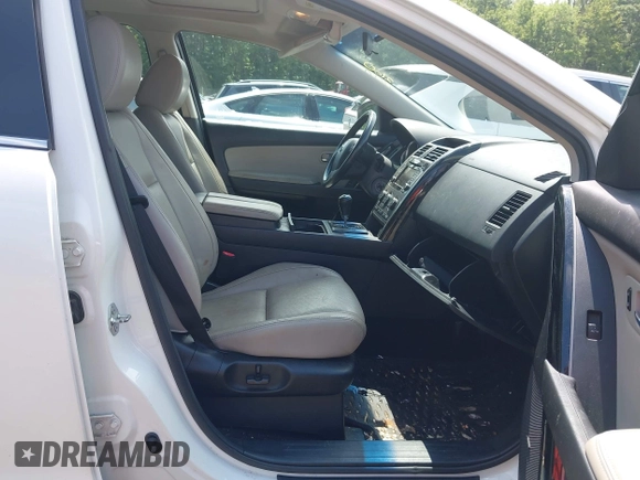 2014 Mazda CX-9 Touring z VIN JM3TB3CV7E0426900, wystawiony jako IAAI lot #42796725 z przebiegiem Nie podano mil oraz . Historia ofert i sprzedaży dostępna na DreamBid. Obrazek 5.