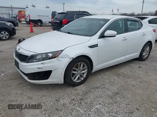 2013 Kia Optima LX with VIN KNAGM4A76D5379047, listed as a IAAI auction lot 41973373 with 135,454 mi miles. Bid and sale history available at carsss.com. Image 2.