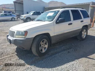 2004 Jeep Grand Cherokee Laredo with VIN 1J4GX48SX4C151160, listed as a IAAI auction lot 42765441 with 176,179 mi miles and . Bid and sale history available at DreamBid. Image 2.