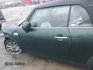 2017 MINI Convertible Cooper S z VIN WMWWG9C38H3C81071, wystawiony jako IAAI lot #41522738 z przebiegiem 59 040 mil mil oraz . Historia ofert i sprzedaży dostępna na DreamBid. Obrazek 14.