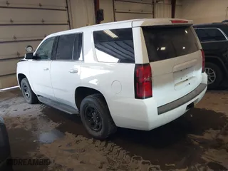 2018 Chevrolet Tahoe Commercial with VIN 1GNSKDEC7JR240082, listed as a IAAI auction lot 41608557 with 111,834 mi miles. Bid and sale history available at carsss.com. Image 3.