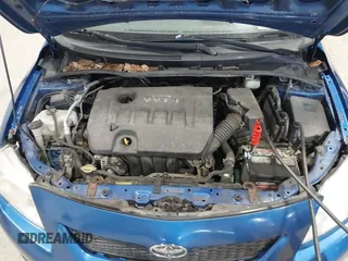 2009 Toyota Corolla with VIN JTDBL40E699037792, listed as a IAAI auction lot 41838231 with 199,690 mi miles. Bid and sale history available at carsss.com. Image 10.
