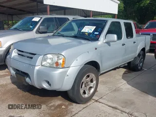 2001 Nissan Frontier z VIN 1N6MD27T91C386609, wystawiony jako IAAI lot #42304953 z przebiegiem 125 921 mil mil oraz . Historia ofert i sprzedaży dostępna na DreamBid. Obrazek 2.