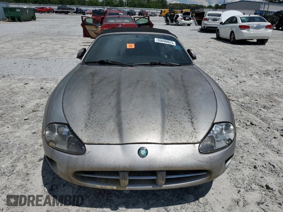 1999 Jaguar XK z VIN SAJGX2049XC034022, wystawiony jako Copart lot #55690025 z przebiegiem Nie podano mil oraz Tytuł czysty. Historia ofert i sprzedaży dostępna na DreamBid. Obrazek 5.