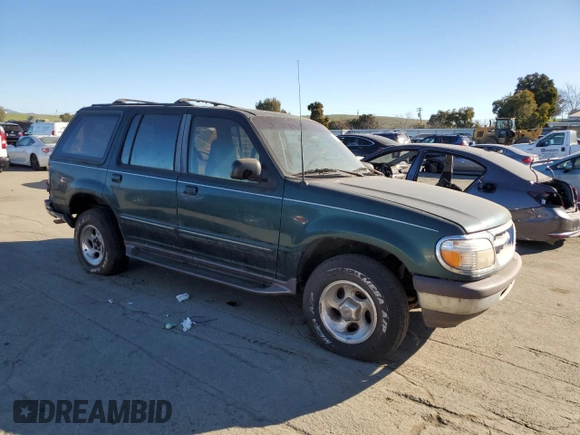 1996 Ford Explorer XL z VIN 1FMDU34X0TUC31973, wystawiony jako Copart lot #87892655 z przebiegiem 142 774 mil mil oraz Tytuł czysty. Historia ofert i sprzedaży dostępna na DreamBid. Obrazek 4.