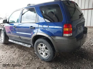 2006 Ford Escape XLT with VIN 1FMYU03166KC05651, listed as a IAAI auction lot 41799174 with 114,594 mi miles. Bid and sale history available at carsss.com. Image 3.