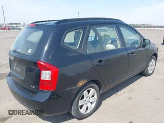 2007 Kia Rondo LX with VIN KNAFG525877029532, listed as a IAAI auction lot 42036604 with 225,698 mi miles. Bid and sale history available at carsss.com. Image 4.