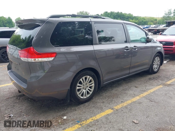 2012 Toyota Sienna XLE AAS with VIN 5TDYK3DC4CS216437, listed as a IAAI auction lot 42550624 with 253,123 mi miles and . Bid and sale history available at DreamBid. Image 4.