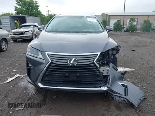 2016 Lexus RX 350 z VIN 2T2BZMCA5GC052214, wystawiony jako IAAI lot #42669843 z przebiegiem 93 891 mil mil oraz . Historia ofert i sprzedaży dostępna na DreamBid. Obrazek 12.
