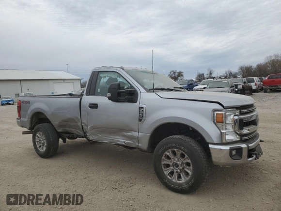 2022 Ford F-250 XL with VIN 1FTBF2B62NED30463, listed as a Copart auction lot 81874934 with 28,994 mi miles and Salvage title. Bid and sale history available at DreamBid. Image 4.
