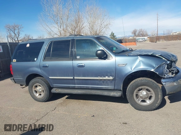 1999 Ford Expedition XLT z VIN 1FMPU18L2XLB43236, wystawiony jako IAAI lot #41792317 z przebiegiem 157 636 mil mil oraz . Historia ofert i sprzedaży dostępna na DreamBid. Obrazek 14.