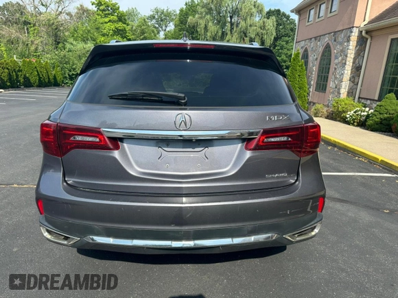 2018 Acura MDX Technology with VIN 5J8YD4H53JL020565, listed as a Copart auction lot 64906135 with 205,899 mi miles and Clean title. Bid and sale history available at DreamBid. Image 6.