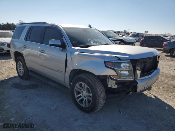 2020 Chevrolet Tahoe LT with VIN 1GNSKBKC9LR267182, listed as a Copart auction lot 42169255 with 99,439 mi miles and Salvage Title. Bid and sale history available at carsss.com. Image 4.