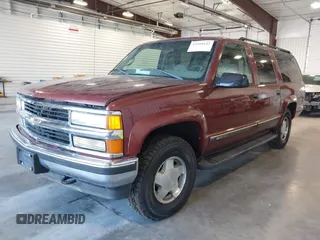 1999 Chevrolet Suburban z VIN 3GNFK16R4XG109638, wystawiony jako IAAI lot #42505642 z przebiegiem 274 795 mil mil oraz . Historia ofert i sprzedaży dostępna na DreamBid. Obrazek 2.