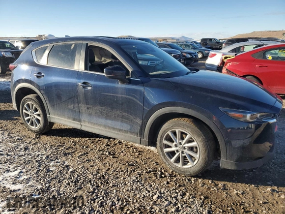 2022 Mazda CX-5 2.5 S Preferred Package with VIN JM3KFBCM0N1591439, listed as a Copart auction lot 45054655 with 56,498 mi miles and Salvage Title. Bid and sale history available at carsss.com. Image 4.