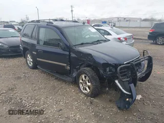 2007 GMC Envoy SLE with VIN 1GKDT13S372158038, listed as a IAAI auction lot 42103078 with 119,954 mi miles. Bid and sale history available at carsss.com. Image 1.