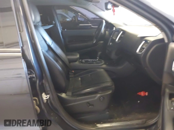 2013 Dodge Durango Citadel with VIN 1C4SDJET2DC529573, listed as a IAAI auction lot 42192878 with 217,445 mi miles and . Bid and sale history available at DreamBid. Image 5.