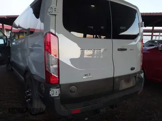 2024 Ford Transit Passenger XL with VIN 1FBAX9YG2RKA76007, listed as a IAAI auction lot 41291052 with 5,741 mi miles and . Bid and sale history available at DreamBid. Image 3.